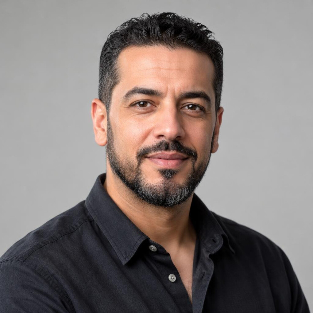 Portrait of a bearded man looking at the camera